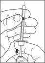 image of drawing air into syringe (#6a)