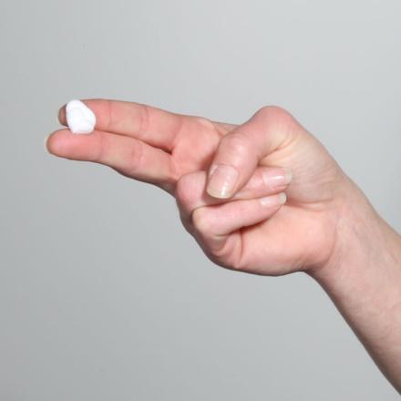 Figure G: Pick up a small amount of EVOCLIN Foam on your fingertips and gently rub into the affected area until the foam disappears