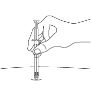 syringe into patient