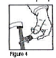 Figure 4: Hold the nasal tip under running, warm tap water (illustrated direction)