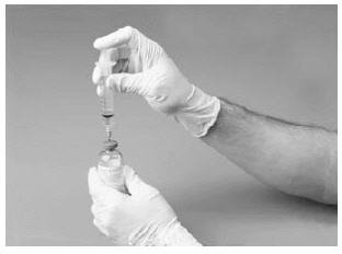 Attach filter needle to a disposable syringe and draw back the plunger to allow air into the syringe. Insert the needle into the reconstituted FVIII concentrate. Inject air into the vial.
