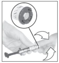 3.   Twist the luer tip cap clockwise or counterclockwise to break the tamper evident label. Remove luer tip cap and discard it. 