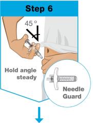 A close-up of a person's hand holding a syringe

Description automatically generated